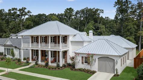 white metal houses|home with white metal roof.